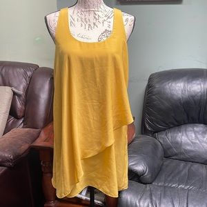 Sleeveless yellow blouse